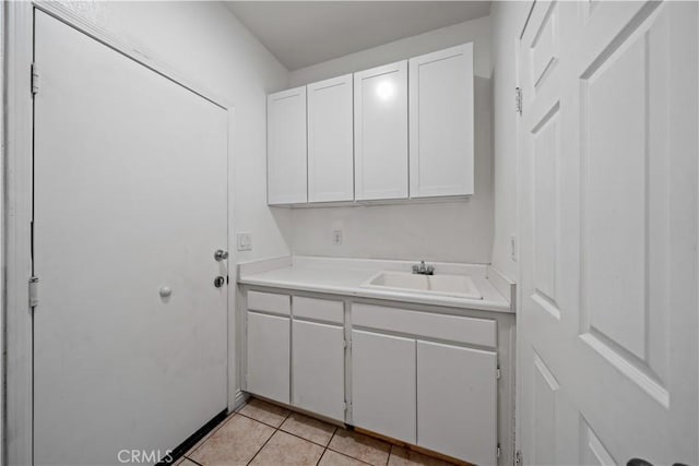 8840 Greenlawn St, Riverside, CA 92508 - laundry room featuring a sink and light tile patterned flooring