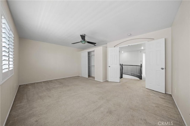 8840 Greenlawn St, Riverside, CA 92508 - unfurnished bedroom with light carpet, baseboards, a ceiling fan, and a closet
