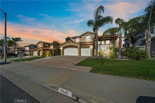 8840 Greenlawn St, Riverside, CA 92508 - view of front of property featuring stucco siding, driveway, a front yard, and a tiled roof