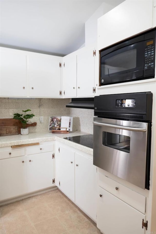 5283 Chollas Pkwy, San Diego, CA 92105 - kitchen featuring black appliances, tasteful backsplash, white cabinets, and light countertops
