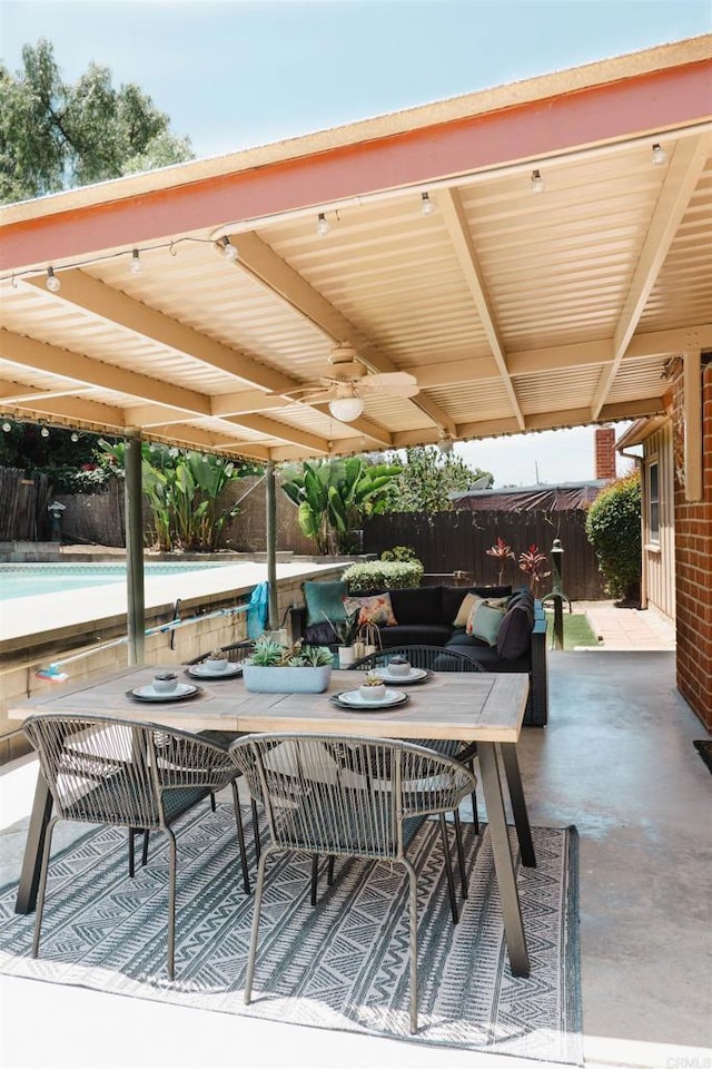 5283 Chollas Pkwy, San Diego, CA 92105 - fenced backyard with outdoor dining space, ceiling fan, and a patio