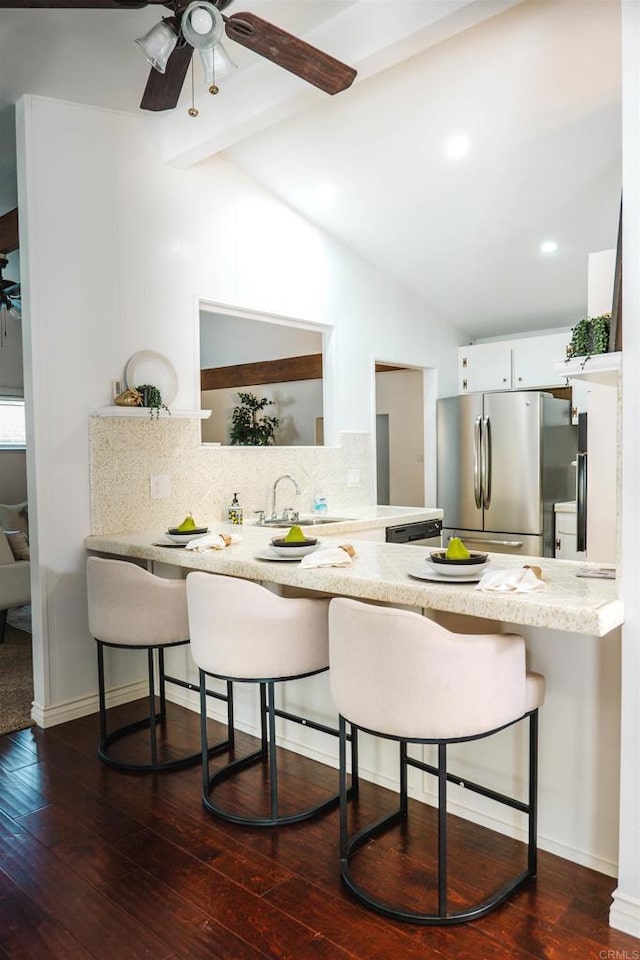 5283 Chollas Pkwy, San Diego, CA 92105 - kitchen featuring freestanding refrigerator, a kitchen breakfast bar, tasteful backsplash, ceiling fan, and recessed lighting
