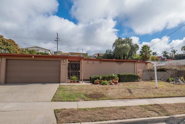 5283 Chollas Pkwy, San Diego, CA 92105 - view of front of home with a garage and concrete driveway