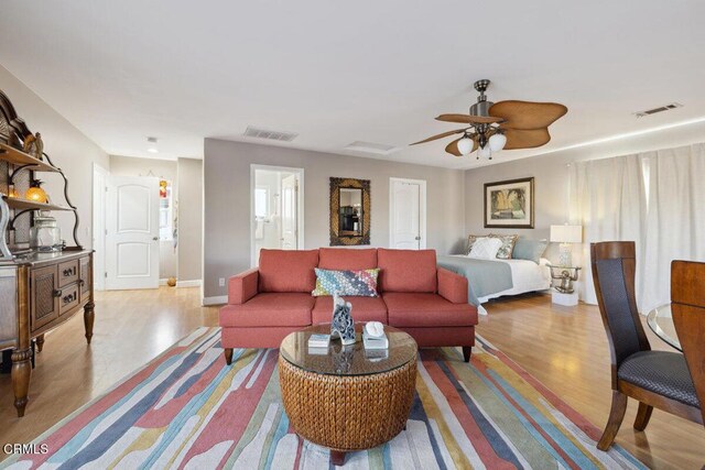 3701 Sunset Ln, Oxnard, CA 93035 - living room featuring wood finished floors, ceiling fan, and baseboards
