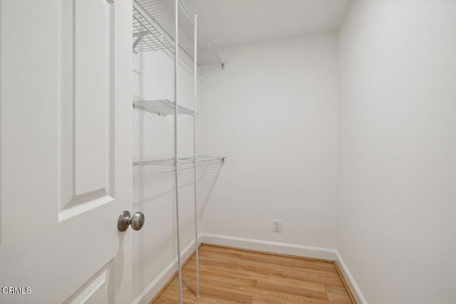 3701 Sunset Ln, Oxnard, CA 93035 - walk in closet featuring light wood-style flooring