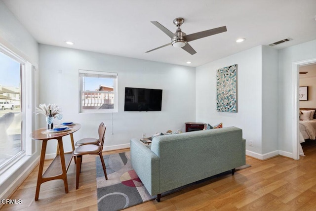 3701 Sunset Ln, Oxnard, CA 93035 - living area with light wood finished floors, ceiling fan, baseboards, and recessed lighting