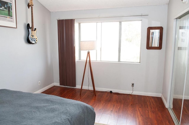 1523 E Windsor Rd Unit 105B, Glendale, CA 91205 - bedroom featuring wood finished floors and baseboards