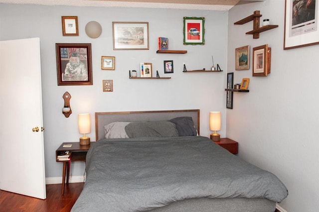 1523 E Windsor Rd Unit 105B, Glendale, CA 91205 - bedroom featuring dark wood-style floors and baseboards