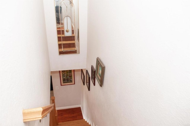 1523 E Windsor Rd Unit 105B, Glendale, CA 91205 - stairway featuring wood finished floors and baseboards