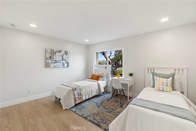 7848 Calmcrest Dr, Downey, CA 90240 - bedroom with wood finished floors, recessed lighting, and baseboards