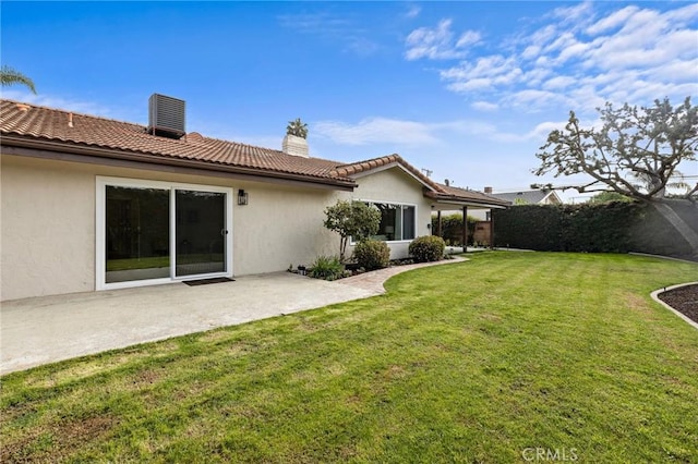 7848 Calmcrest Dr, Downey, CA 90240 - back of house with a chimney, a patio, stucco siding, and a tiled roof