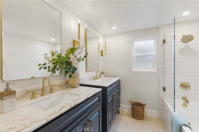7848 Calmcrest Dr, Downey, CA 90240 - bathroom with two vanities, tile patterned floors, baseboards, and shower / washtub combination