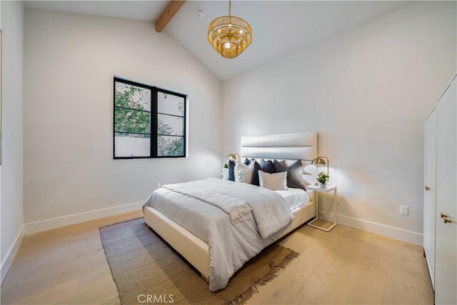 4634 Vesper Ave, Sherman Oaks, CA 91403 - bedroom with light wood finished floors and a chandelier