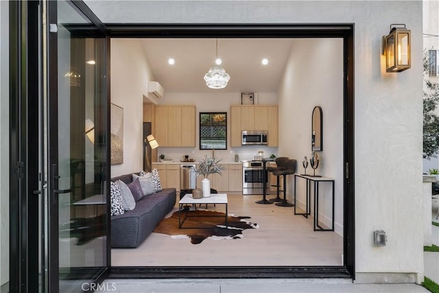 4634 Vesper Ave, Sherman Oaks, CA 91403 - living room featuring baseboards and light wood-type flooring