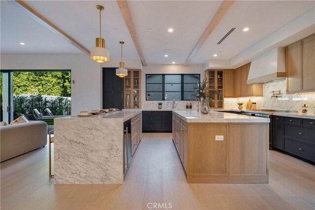 4634 Vesper Ave, Sherman Oaks, CA 91403 - kitchen featuring a large island, custom range hood, beamed ceiling, backsplash, and recessed lighting