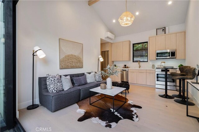 4634 Vesper Ave, Sherman Oaks, CA 91403 - living area with light wood-style floors, high vaulted ceiling, a chandelier, recessed lighting, and beamed ceiling