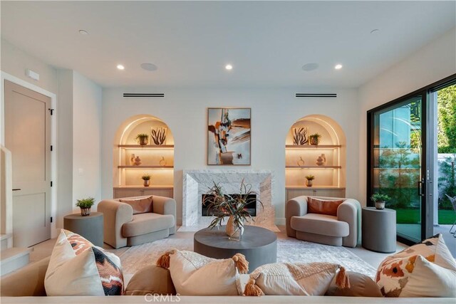 4634 Vesper Ave, Sherman Oaks, CA 91403 - living area featuring built in features, a high end fireplace, and recessed lighting