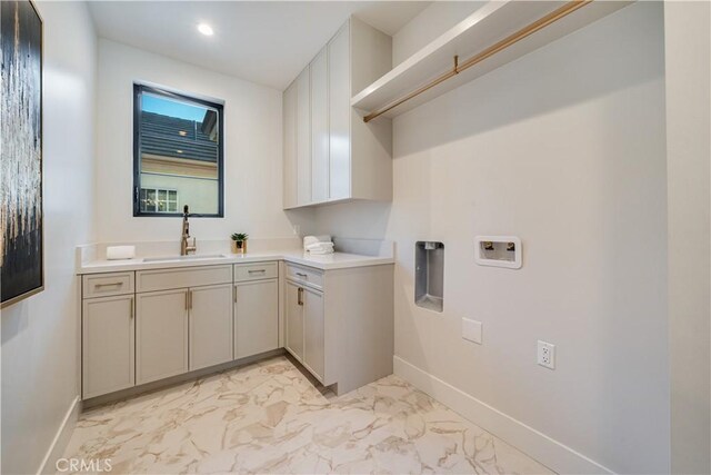 4634 Vesper Ave, Sherman Oaks, CA 91403 - laundry area with light marble finish flooring, cabinet space, hookup for a washing machine, and recessed lighting