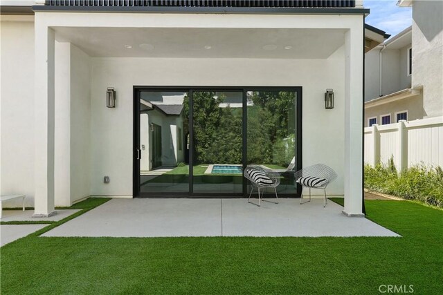 4634 Vesper Ave, Sherman Oaks, CA 91403 - back of house featuring stucco siding and a patio area