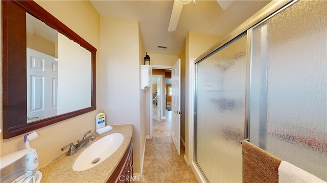 14862 Temple Ave, La Puente, CA 91744 - full bath with a shower stall, vanity, tile patterned floors, and ceiling fan