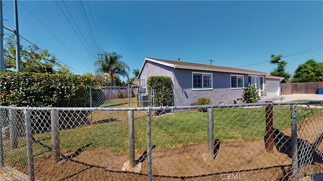 14862 Temple Ave, La Puente, CA 91744 - view of front of house featuring stucco siding, concrete driveway, and a garage