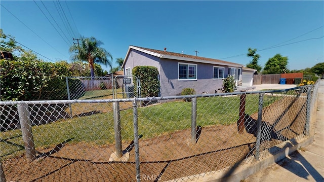 14862 Temple Ave, La Puente, CA 91744 - ranch-style home featuring stucco siding and driveway