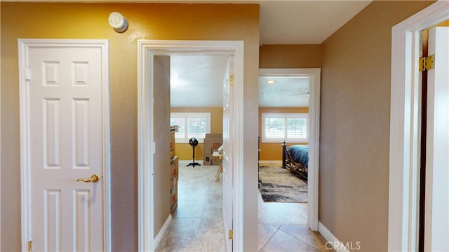 14862 Temple Ave, La Puente, CA 91744 - hall with baseboards and light tile patterned floors