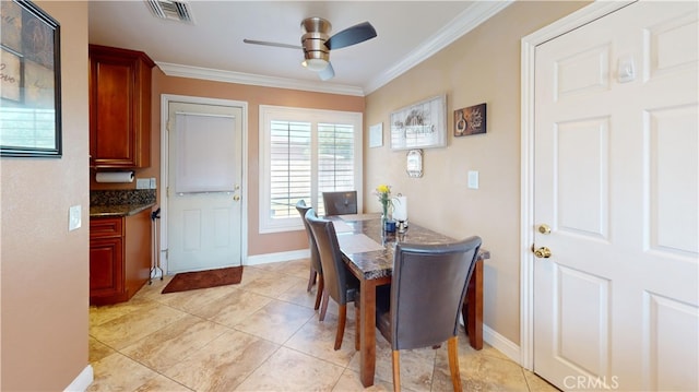 14862 Temple Ave, La Puente, CA 91744 - dining space with a ceiling fan, crown molding, baseboards, and light tile patterned floors