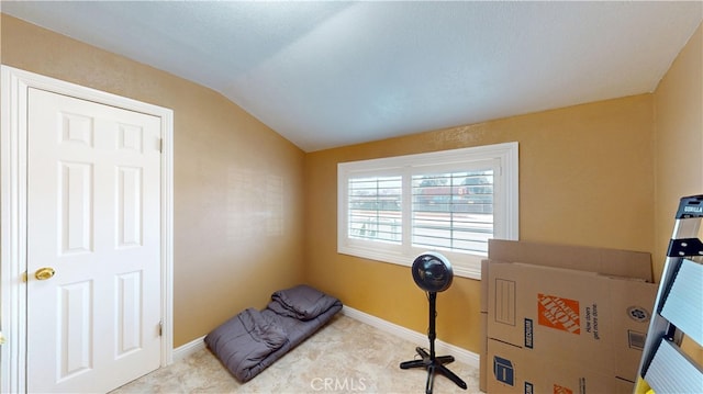 14862 Temple Ave, La Puente, CA 91744 - workout room with vaulted ceiling, carpet floors, and baseboards