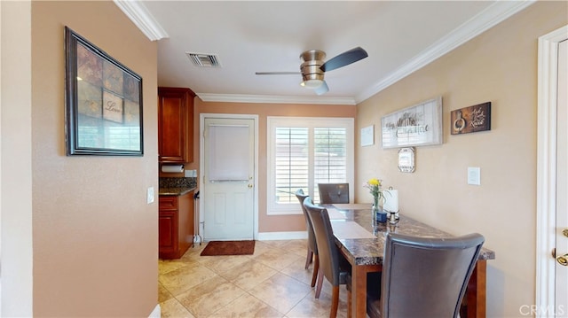14862 Temple Ave, La Puente, CA 91744 - dining room featuring ceiling fan, ornamental molding, light tile patterned floors, and baseboards