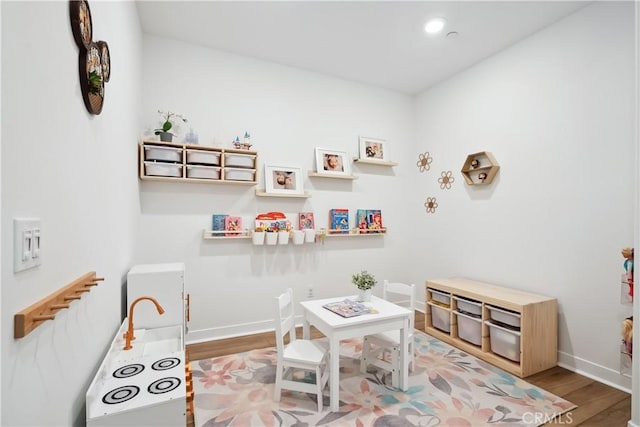 1101 Lasso Way Unit 303, Rancho Mission Viejo, CA 92694 - rec room with wood finished floors, baseboards, and recessed lighting