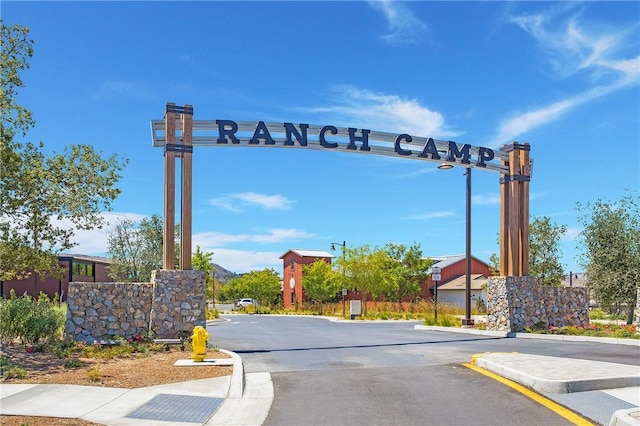 1101 Lasso Way Unit 303, Rancho Mission Viejo, CA 92694 - view of asphalt road featuring curbs