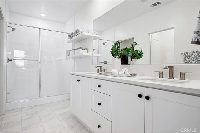 1101 Lasso Way Unit 303, Rancho Mission Viejo, CA 92694 - full bathroom with double vanity, a stall shower, marble look tiles, and recessed lighting