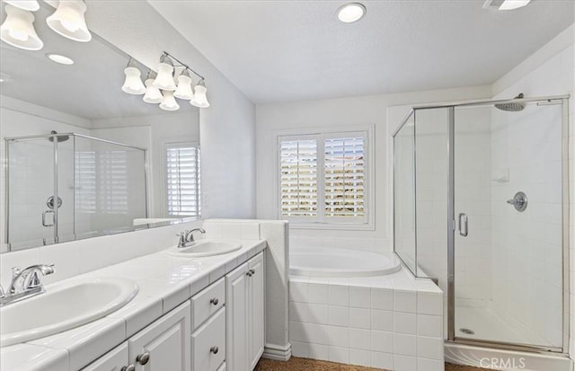 28229 Shirley Ln, Saugus, CA 91350 - full bathroom featuring a shower stall, a bath, double vanity, and recessed lighting