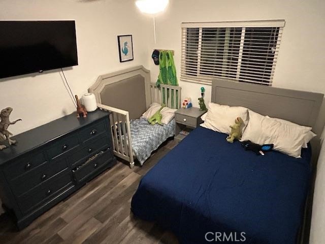 321 N Brampton Ave, Rialto, CA 92376 - bedroom with wood finished floors