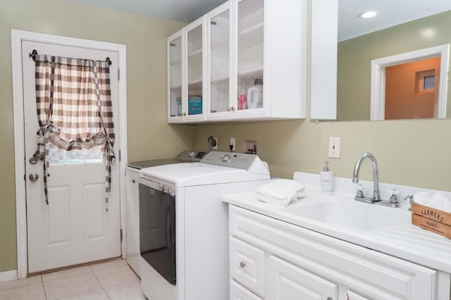 13965 Woods Valley Rd, Valley Center, CA 92082 - washroom with cabinet space, washing machine and dryer, and light tile patterned floors
