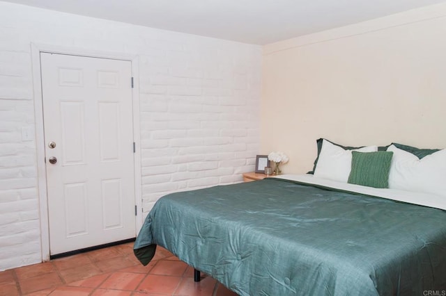 13965 Woods Valley Rd, Valley Center, CA 92082 - bedroom featuring tile patterned floors and brick wall