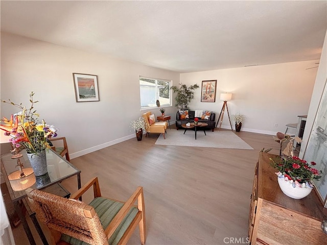16387 De Anza Cir Unit Ci60, Huntington Beach, CA 92649 - living area featuring baseboards and wood finished floors