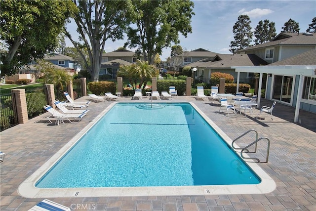 16387 De Anza Cir Unit Ci60, Huntington Beach, CA 92649 - community pool featuring a patio and a residential view