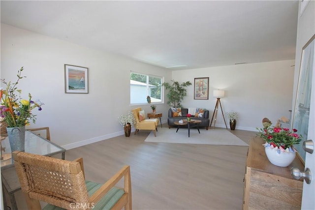 16387 De Anza Cir Unit Ci60, Huntington Beach, CA 92649 - living room with wood finished floors and baseboards
