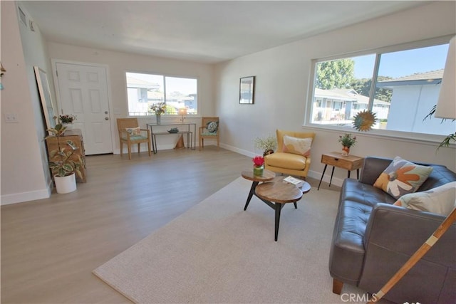 16387 De Anza Cir Unit Ci60, Huntington Beach, CA 92649 - living area featuring wood finished floors and baseboards