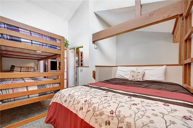 261 Lakeview Blvd Unit 54, Mammoth Lakes, CA 93546 - bedroom featuring carpet floors and high vaulted ceiling