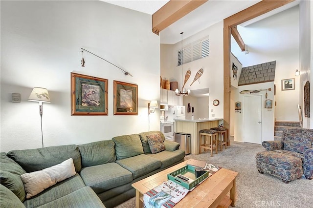 261 Lakeview Blvd Unit 54, Mammoth Lakes, CA 93546 - living area featuring light colored carpet and a towering ceiling