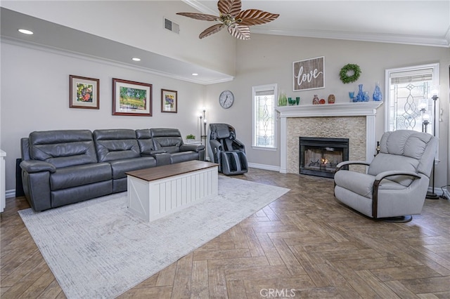 41167 Via Cielito, Temecula, CA 92591 - living area featuring a ceiling fan, lofted ceiling, a glass covered fireplace, recessed lighting, and crown molding