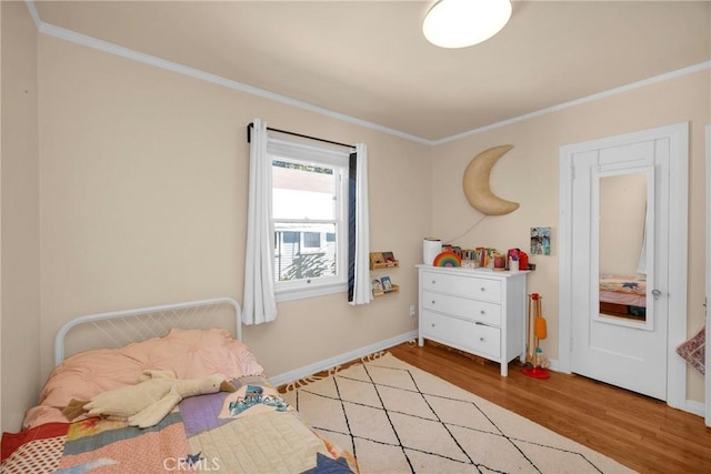 225 E 56th St, Long Beach, CA 90805 - bedroom featuring wood finished floors and ornamental molding