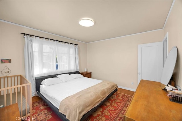 225 E 56th St, Long Beach, CA 90805 - bedroom with wood finished floors and crown molding