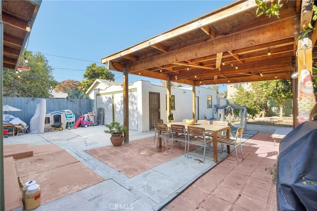 225 E 56th St, Long Beach, CA 90805 - view of patio / terrace featuring outdoor dining space, a grill, and an outdoor structure