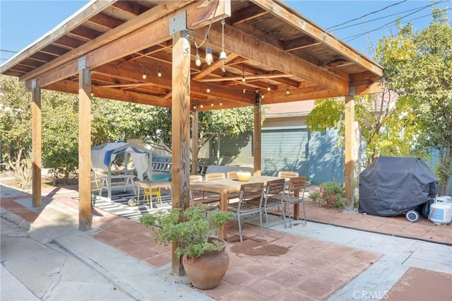 225 E 56th St, Long Beach, CA 90805 - view of patio with area for grilling and outdoor dining area
