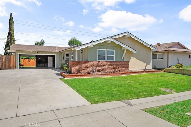 18557 Mescal St, Rowland Heights, CA 91748 - ranch-style house with board and batten siding, driveway, and an attached garage