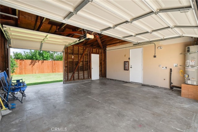 18557 Mescal St, Rowland Heights, CA 91748 - garage with secured water heater and a garage door opener